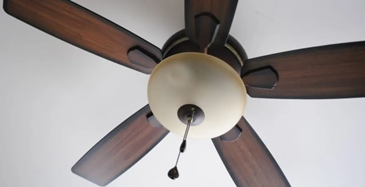 Fully installed ceiling fan with balanced blades and light fixture in San Diego, CA