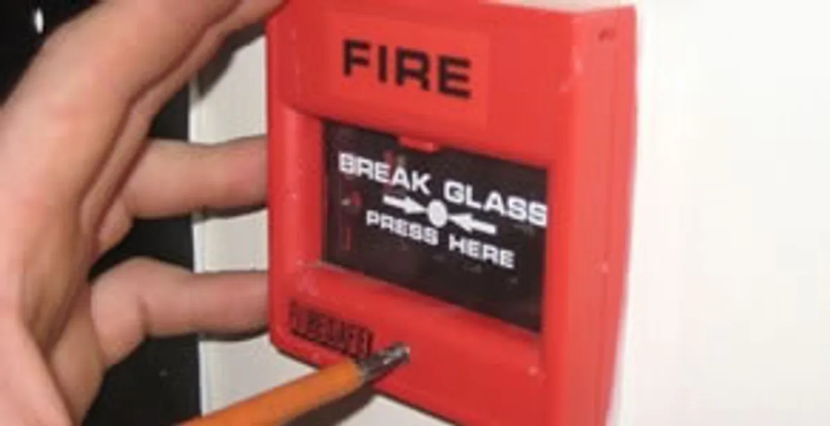 fire alarm installation service showing manual fire alarm pull station installed by licensed electricians in San Diego, CA
