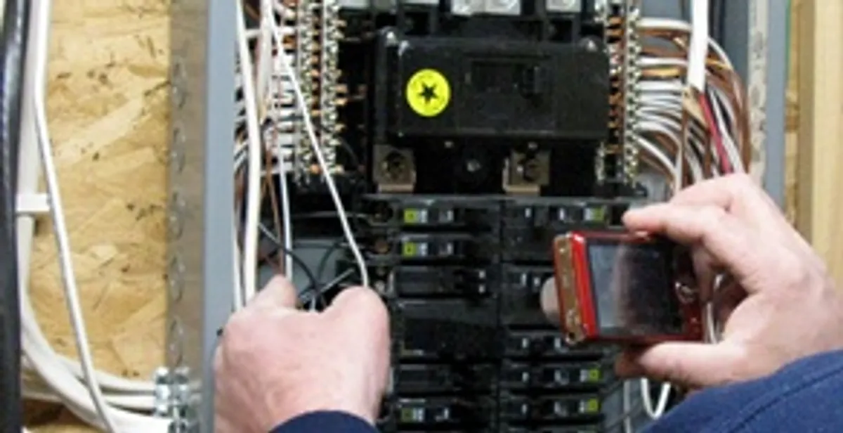 Home electrical inspection of circuit breaker panel by licensed electrician in San Diego, CA