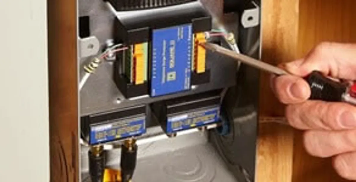 Whole home surge protection device being installed by a licensed electrician to protect electrical systems in San Diego, CA